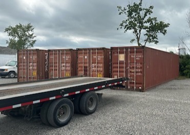 Préparation terrain pour la livraison de conteneurs maritimes de 40 pieds à Montréal, Québec - Gravier - Conteneurs KJS Containers Inc